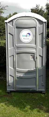 view of portable toilet unit on construction site